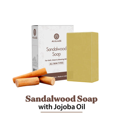 Sandalwood soap with packaging and jojoba oil sticks on a white background